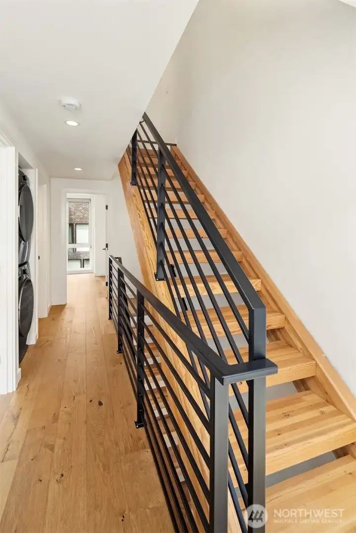 Gorgeous hardwood and iron railing detail Gorgeous hardwood and iron railing detail