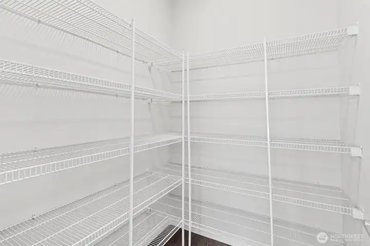 Large walk-in pantry adds exceptional functionality rarely found in townhome living. Large walk-in pantry adds exceptional functionality rarely found in townhome living.