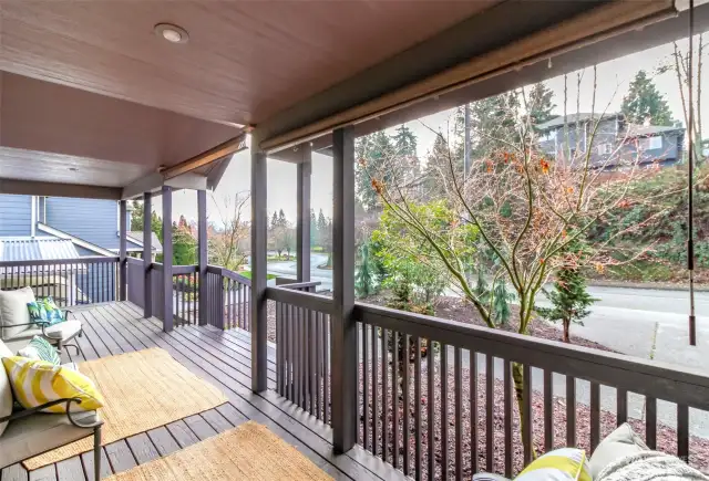 Broad covered front porch creates a nice space for relaxing in the morning or evening.