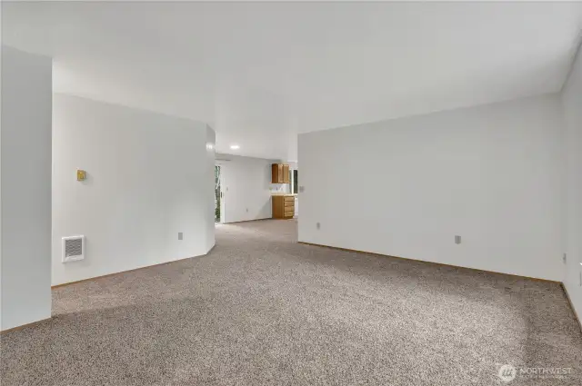 ~ View of living room from front door entrance to home ... Nice large living area. ~