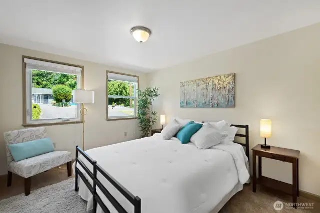 The third bedroom is ideal for guests or choose this as the primary with adjacent half bath. This room could also be a family/media room or a home office.