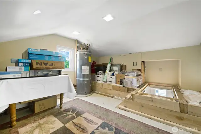 Great attic storage accessed by a pull-down stair in the back hall.