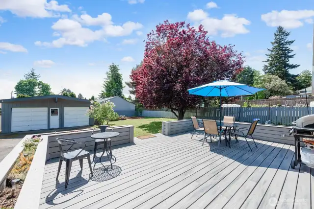 Just off the kitchen this magnificent deck expands your living and entertaining space. This deck has room for a crowd!