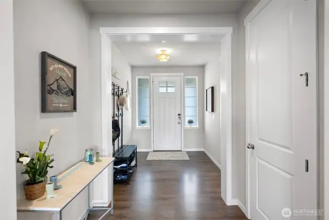 Inviting foyer with wide hallways