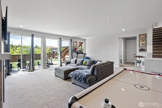 Sliding glass doors lead to your large yard