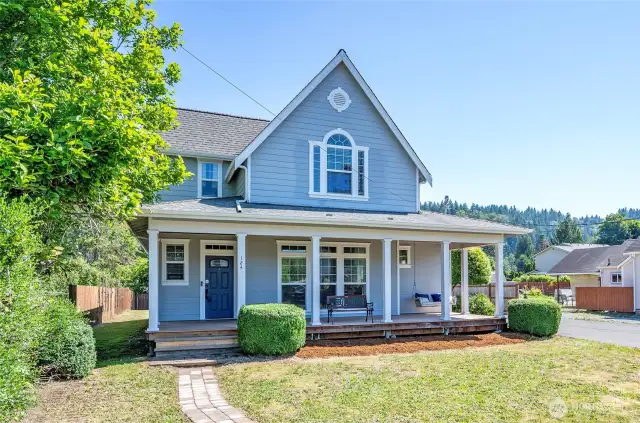 Relax on the welcoming covered front porch and enjoy friendly waves from neighbors passing by.