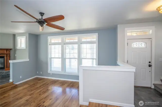 Upon entering, you’ll find the entry on the right and the comfortable living space to the left.