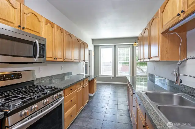 From the kitchen, take in a lovely view of the connected dining space.
