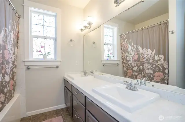 Dual sinks add both practicality and elegance to the primary ensuite.