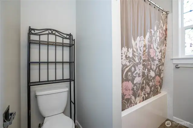 A second look at the primary ensuite reveals more of its elegant details.