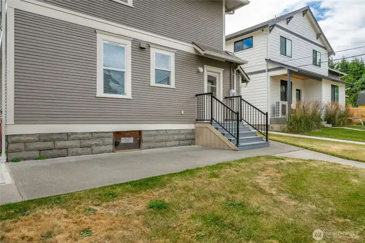 Patio area, and the access to the partial basement is shown here.