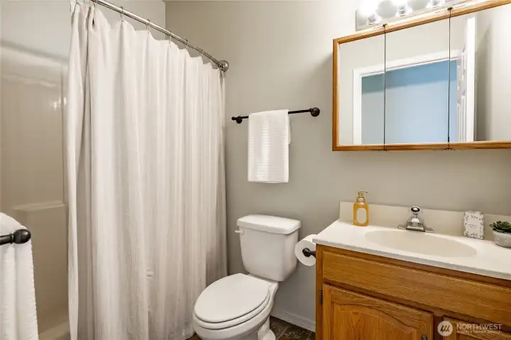 First floor full bath is adjacent to the bedroom.