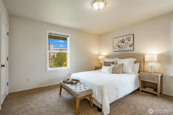 Upstairs Primary Suite with large walk-in closet.