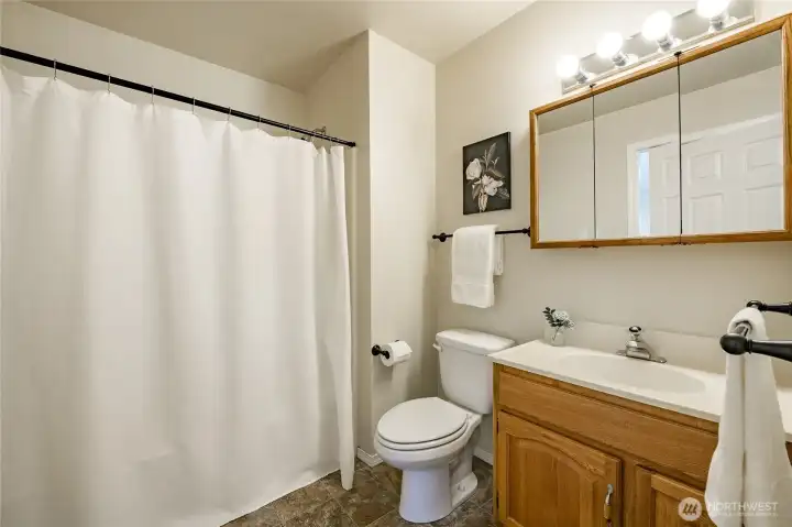 Primary bath also has hallway access door.