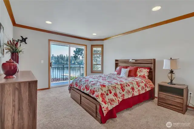 Master bedroom with lake view deck