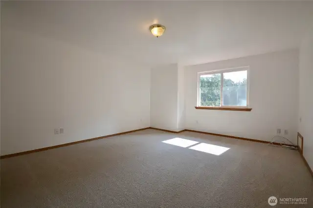 Primary bedroom. new carpet 2025.