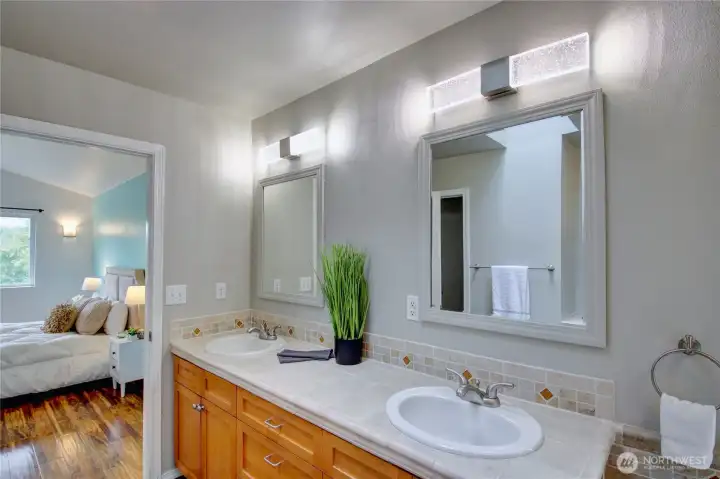 Large in suite primary bathroom with double vanity.