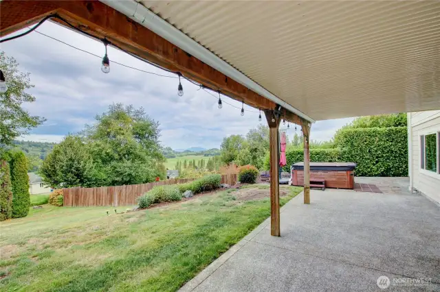 The covered paito is a great place to enjoy the view and is the entrance to the lower level.
