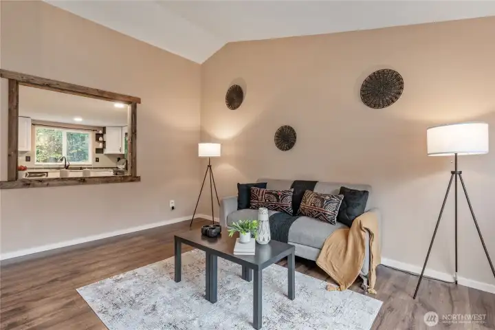 Living room with vaulted ceilings