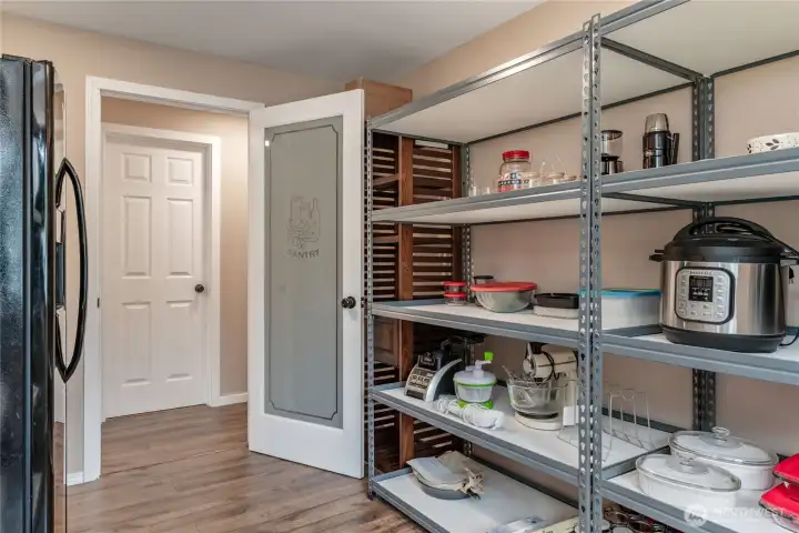Large pantry that could also be used as home office or flex space. No closet. Refridgerator can stay
