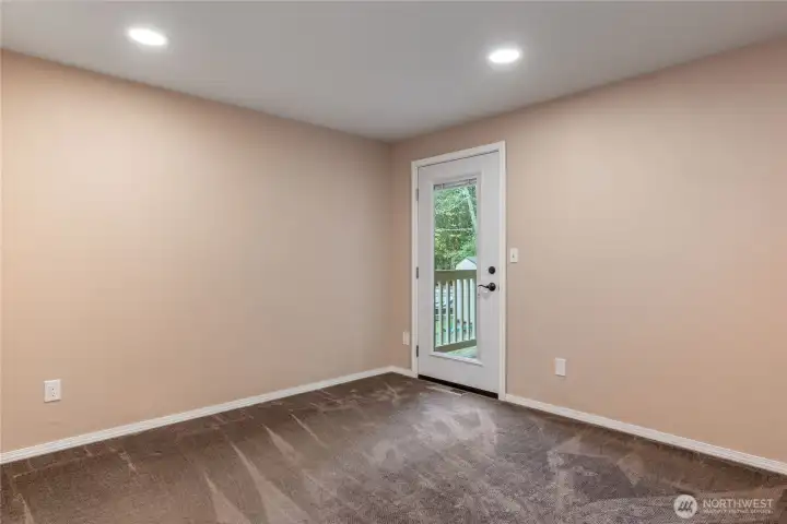 2nd Bedroom with french door to covered back deck.