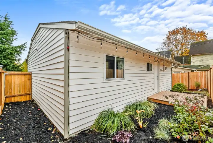 Other side showing more of the back yard