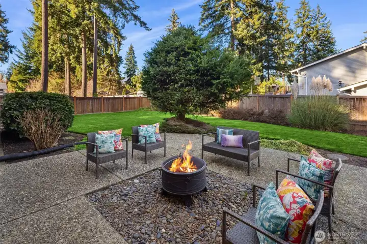 The flat, fully fenced backyard is ideal for entertaining.