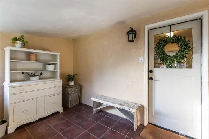 Covered porch to drop your shoes and bags before entering.