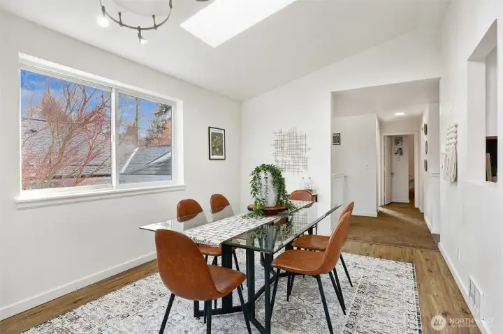 Generous dining area with pass-through to the kitchen