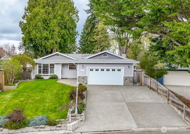 The home offers plenty of parking with a 2 car garage and driveway parking for 4 cars.