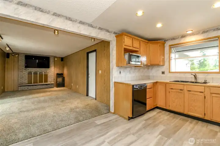 The kitchen is efficiently located in the center of the home with easy access to the family room and living room.