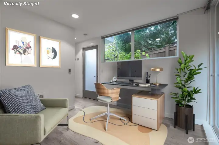 Entryway office area can accommodate two desks.