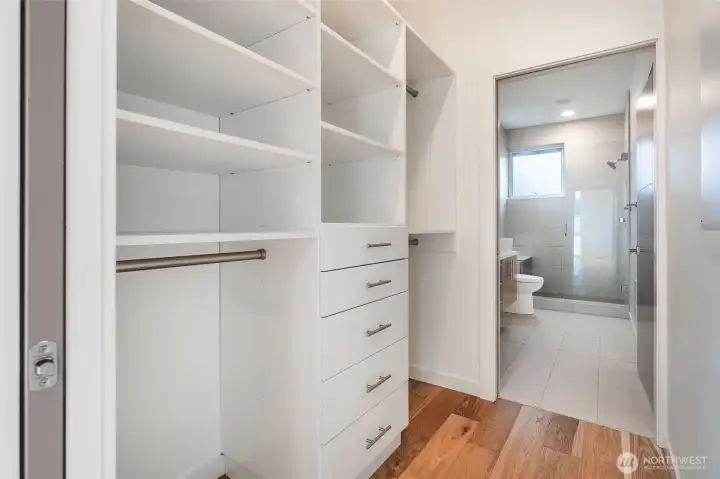 Pass-through closet has convenient built-ins ready to go.