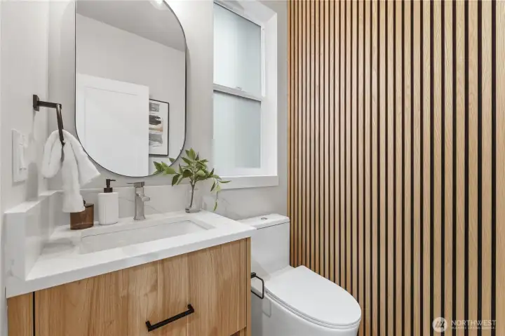 Powder room on main floor off mudroom