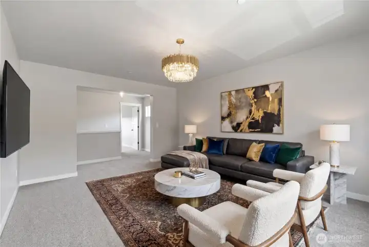 Virtually staged upstairs bonus room, TV room