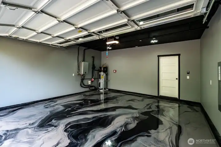 Fully finished garage with custom floor & lighting