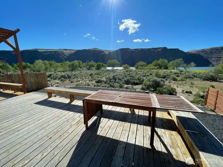 Large deck area with lots of sitting areas
