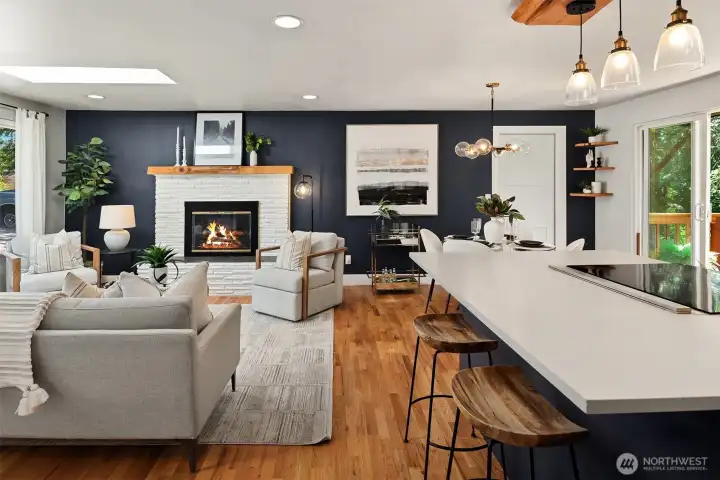 Designed for effortless entertaining, the open-concept living, dining, and kitchen spaces provide a seamless flow for gathering with family and friends.
