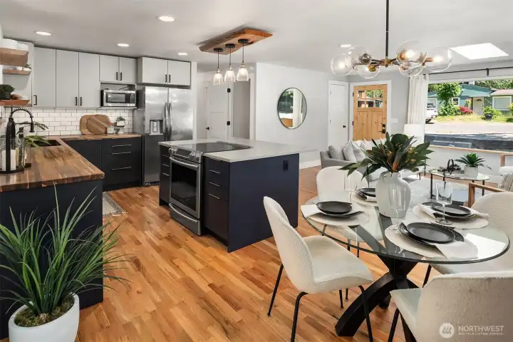 Beautiful hardwood floors add warmth, character, and timeless appeal throughout the living spaces.
