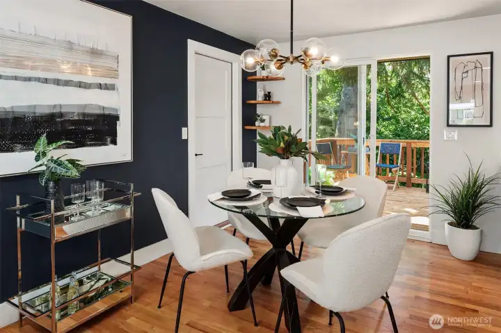 The inviting dining area comfortably accommodates up to six guests, making it ideal for everyday meals and memorable gatherings.