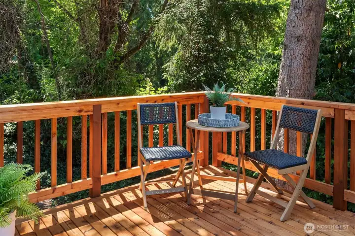 Imagine starting your day with a cup of coffee beneath the canopy of mature trees in your private backyard—a peaceful Pacific Northwest retreat to relax, unwind, and connect with nature.