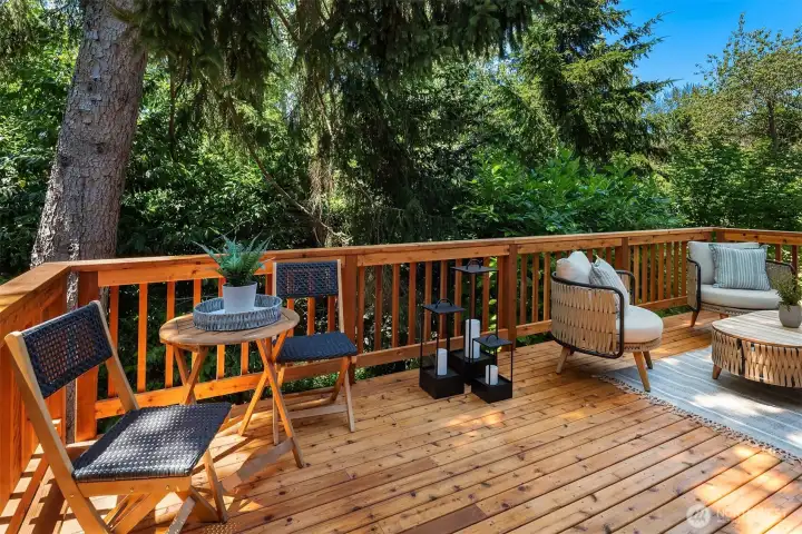 Nature is just beyond your back deck, where lush greenery creates a peaceful backdrop. Relax to the soothing sounds of birdsong and rustling trees while enjoying the privacy and serenity of your own Pacific Northwest oasis.
