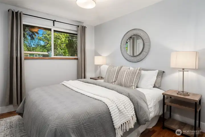 Third bedroom on the main level, offering flexible space to accommodate your lifestyle needs.