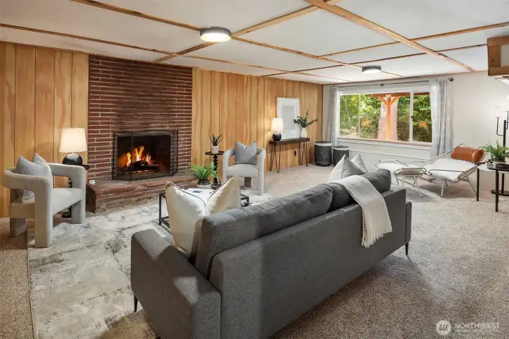 Spacious lower-level recreation room, perfect for game nights, movie marathons, or creating the ultimate gathering space for family and friends.