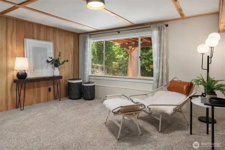 Expansive lower-level living area offers exceptional flexibility, with plenty of space to create a media room, game room, home office, fitness area, or multiple gathering spaces.