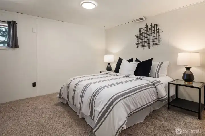 Lower-level non-conforming bedroom offering flexible space for guests, a home office, hobby room, or additional living needs.