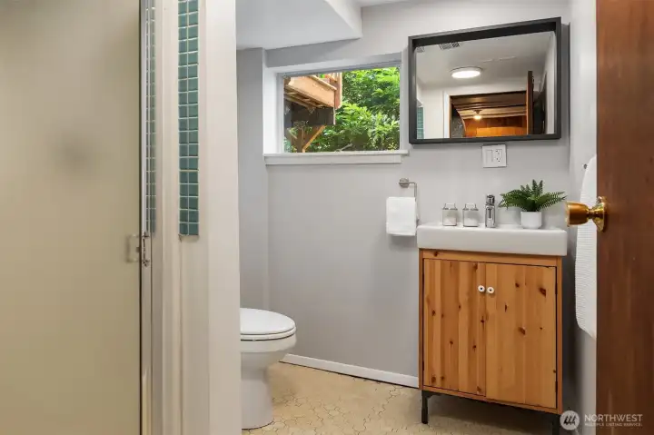 Convenient lower-level ¾ bathroom, thoughtfully positioned to serve the recreation area and additional bedrooms.