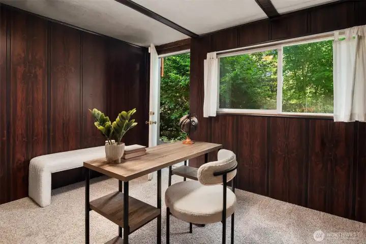 A versatile space with direct backyard access, perfect for a home office, gear room, or creative studio—ideal for storing bikes, skis, kayaks, and all your Pacific Northwest adventure essentials.