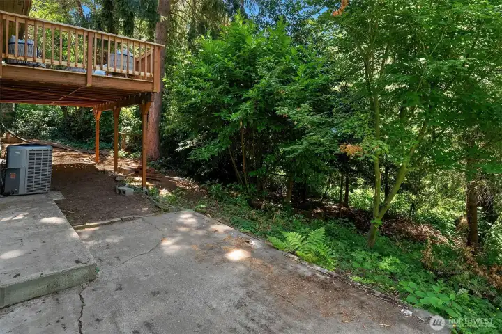 A private patio offers the perfect setting for a hot tub, outdoor lounge, or cozy fire pit, all surrounded by the peace and privacy of your expansive 17,272-square-foot property.