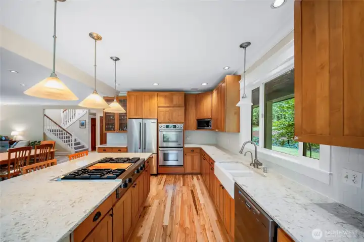 This eight foot island was added. With easy care quartz counters and a full height tile, backsplash, cooking here is a breeze! This eight foot island was added. With easy care quartz counters and a full height tile, backsplash, cooking here is a breeze!